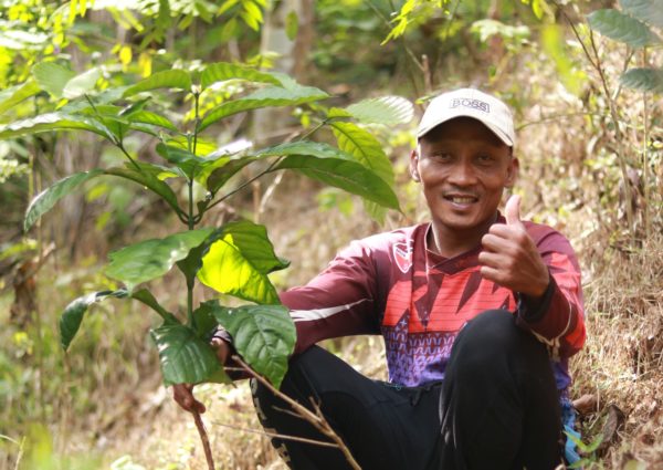 Tasum, a farmer from Silogiri village